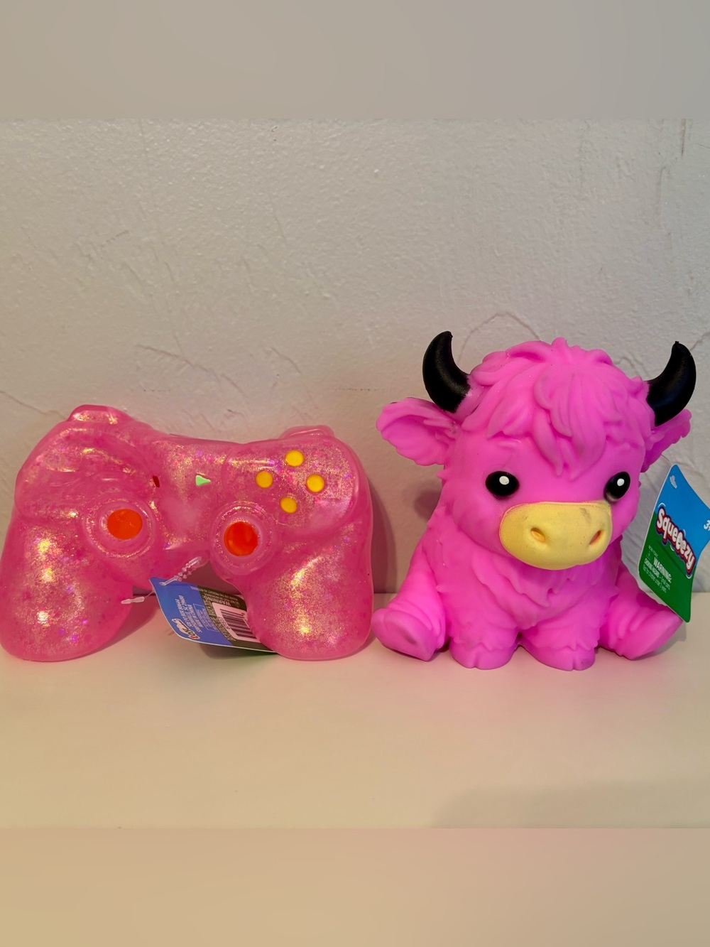 Pink Squeeezy Highland Cow Squishy Toy + Pink Squeeezy Game Controller